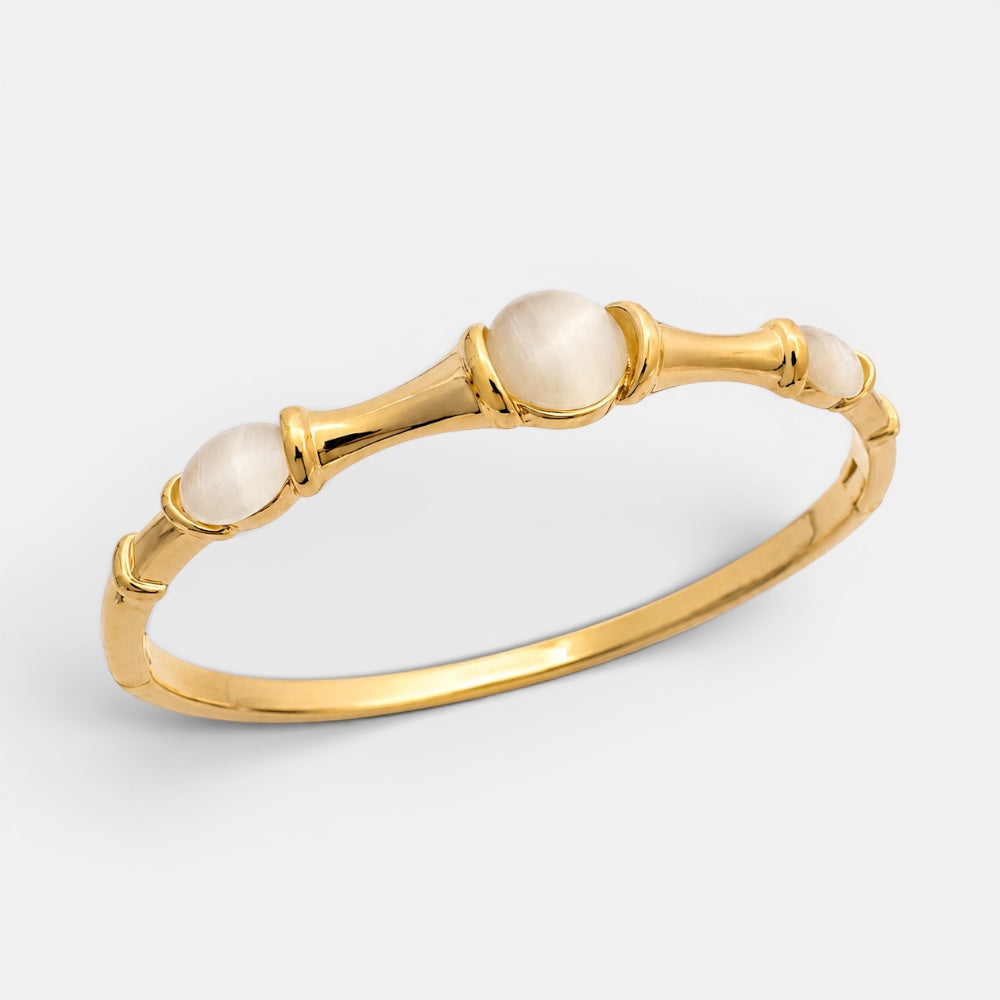 Gold plated bangle with cat eye stone close-up