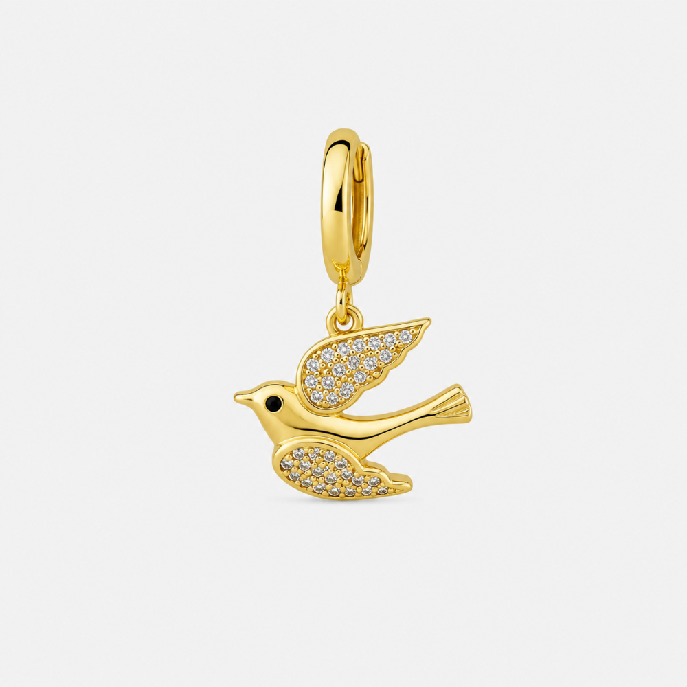 Gold plated peace dove charm close-up