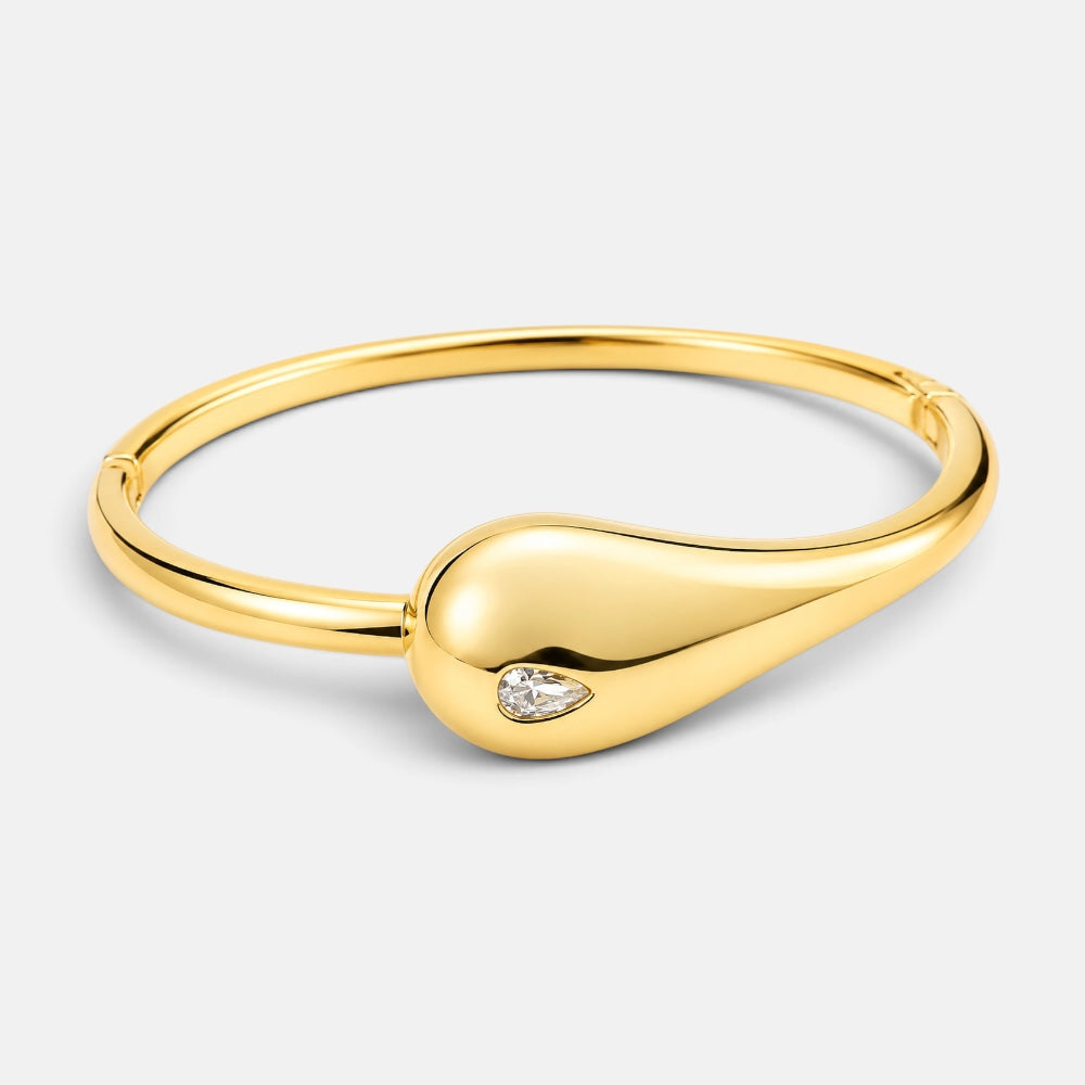 Gold plated teardrop bangle with small cubic zirconia accent