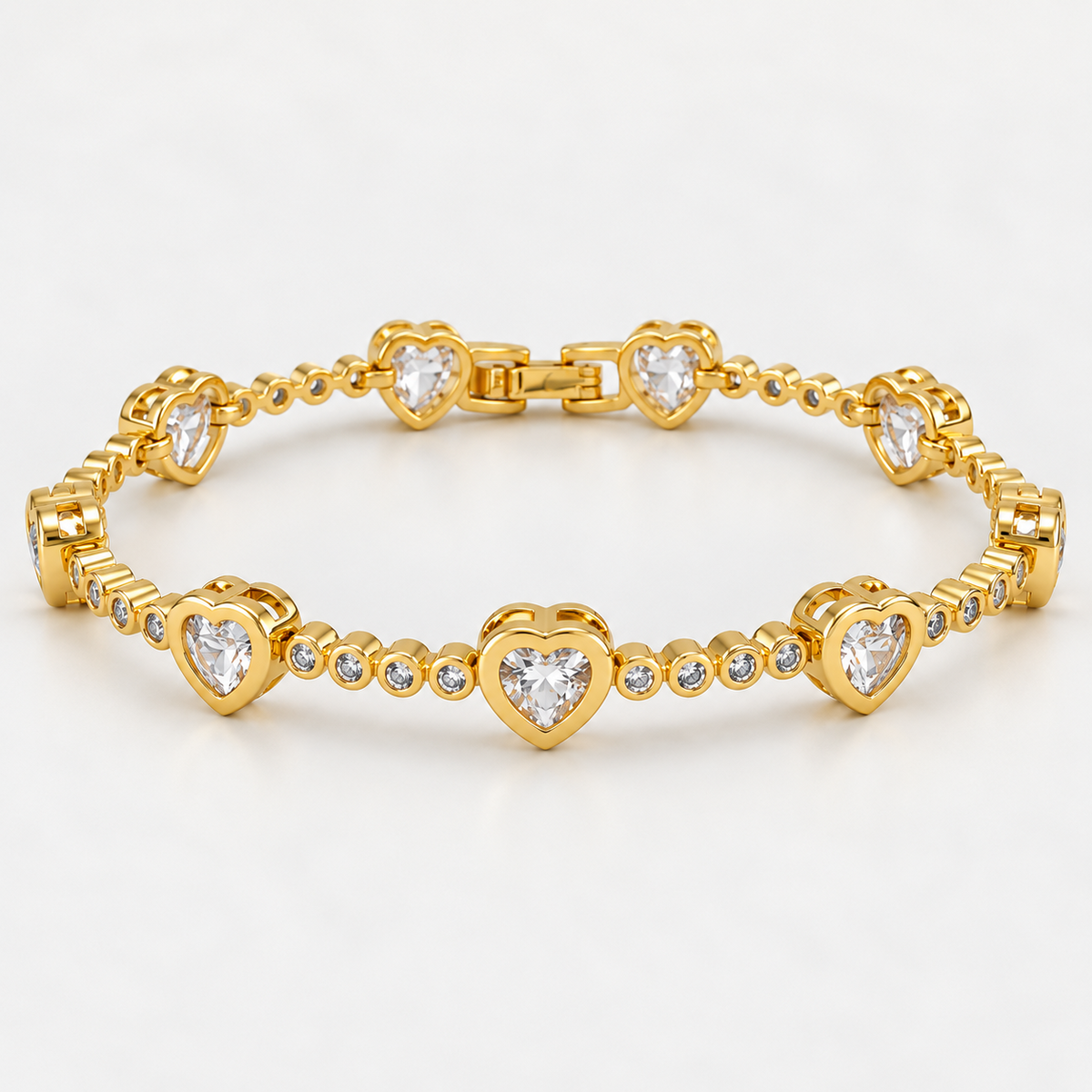 18ct gold-plated brass 17 cm bracelet with heart-shaped clear cubic zirconia and small round bezel-set zirconia links