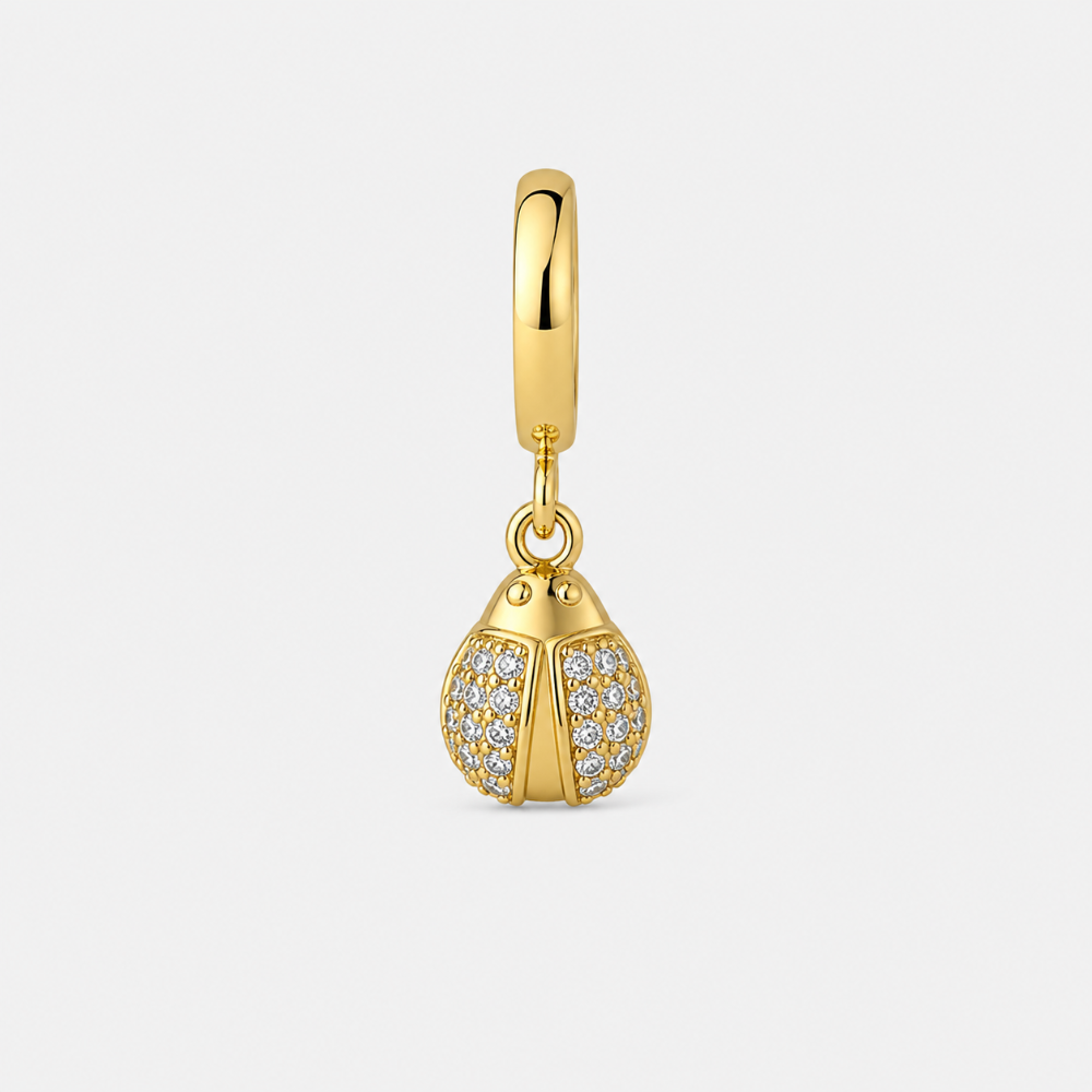 Gold plated ladybug charm close-up