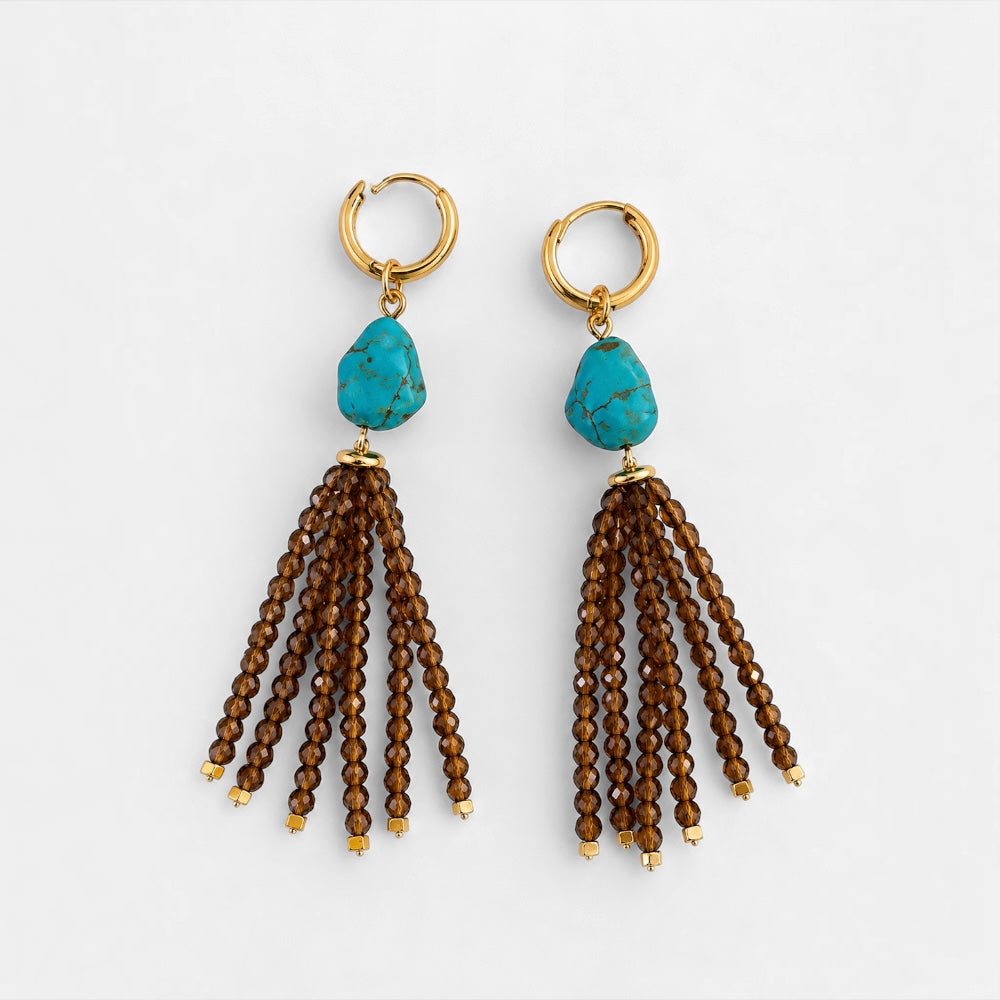 Gold-plated hoop earrings with reconstituted turquoise stones and long brown jade bead tassels, full view