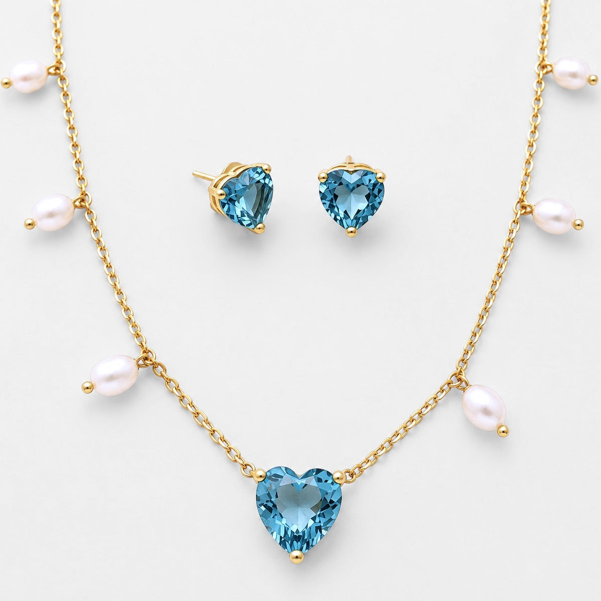 Freshwater pearl and crystal heart necklace and earrings set with gold plated finish