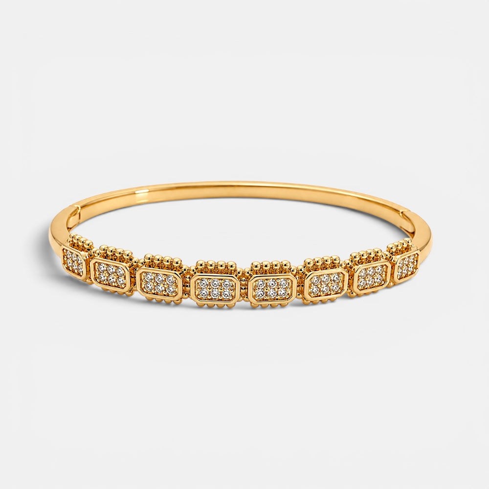Gold plated bangle with textured zirconia detail