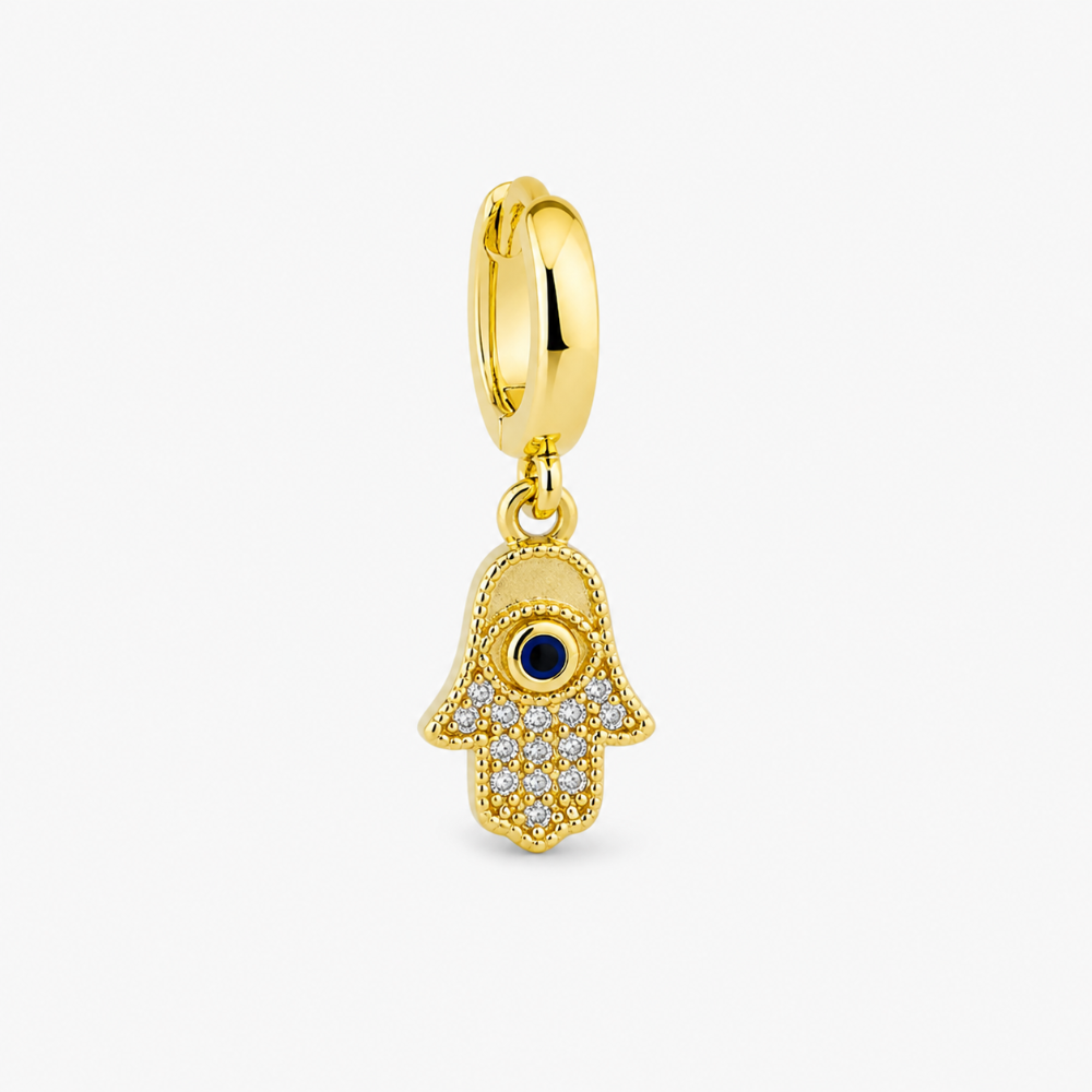 Gold plated hamsa charm on white background