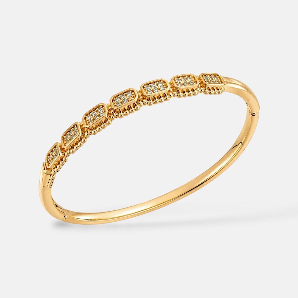 Gold plated textured zirconia bangle close-up