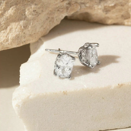 Solitaire stud oval earrings