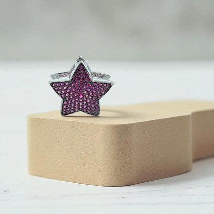 Pink star charm