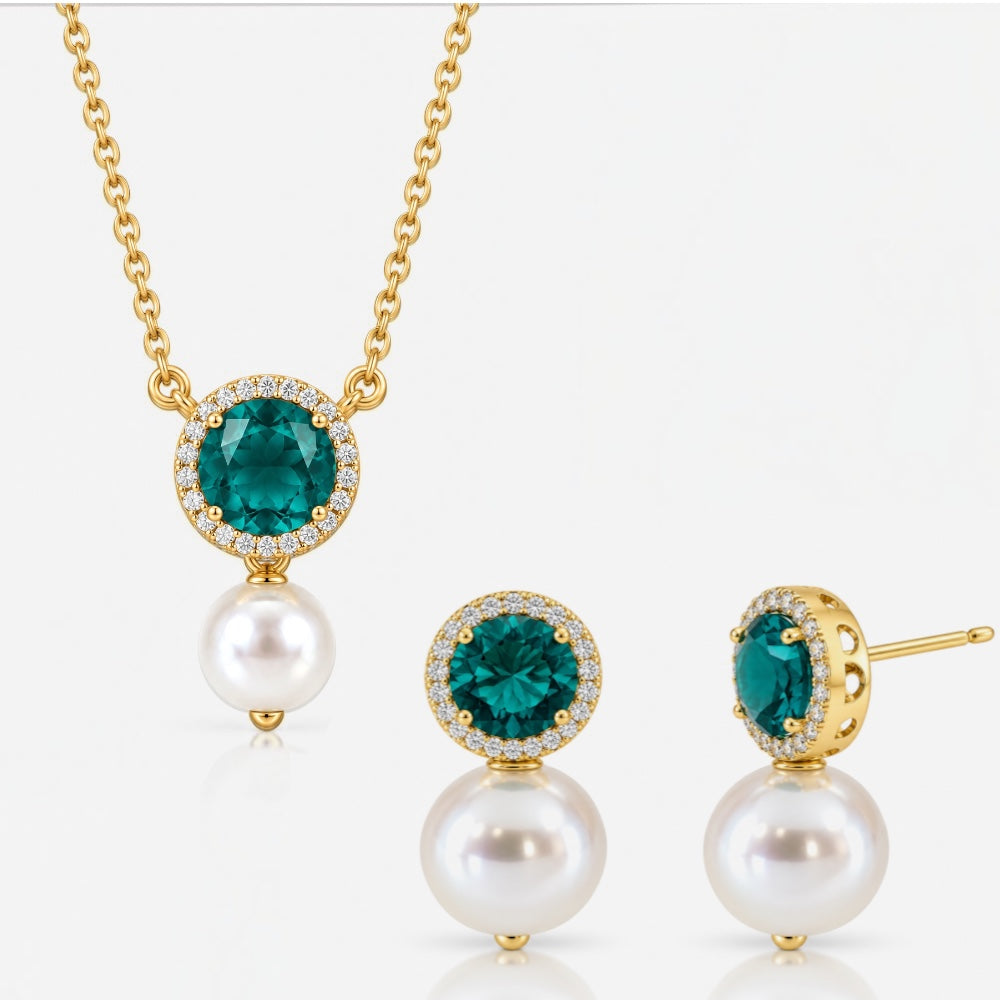 Gold emerald-coloured crystal necklace and matching shell pearl drop earrings set