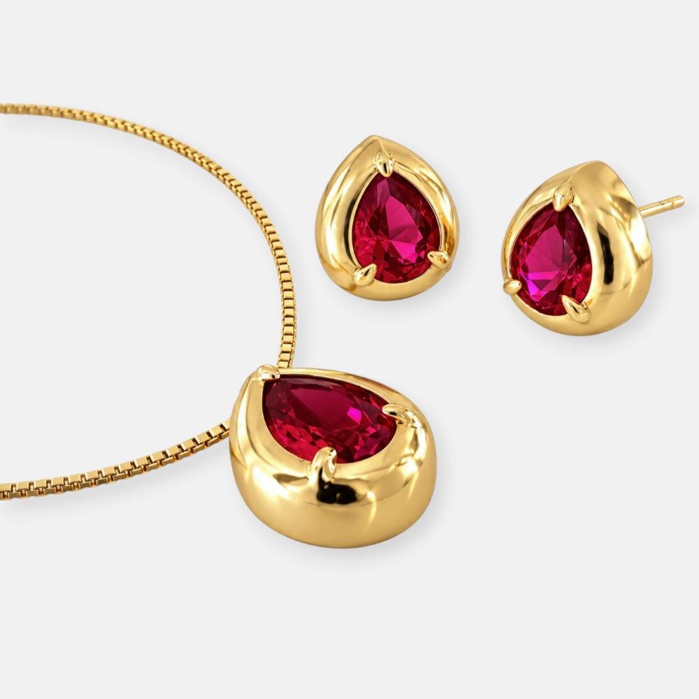 Gold January birthstone jewellery set with garnet red stones