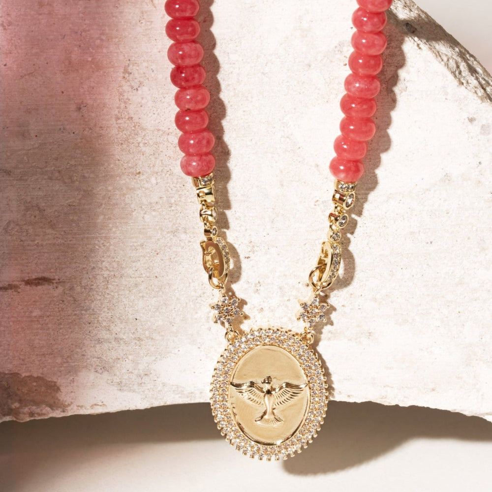 18ct gold-plated brass necklace with pink lab-made cherry crystal beads and Holy Spirit dove medal framed by clear cubic zirconia