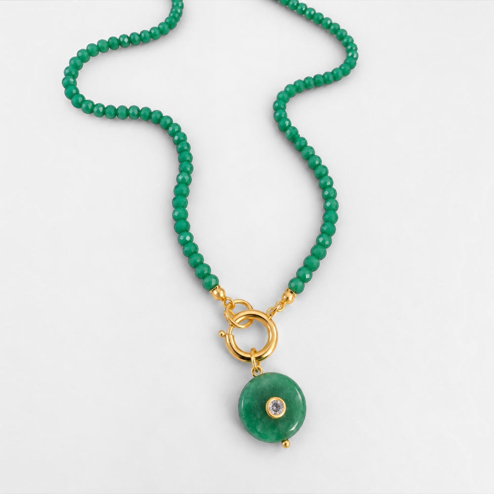 Emerald-green jade beaded necklace with round green jade pendant and gold-plated circular clasp